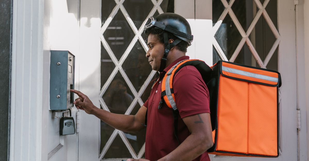 locksmith unlocking front door — Augustine Locksmith Pro